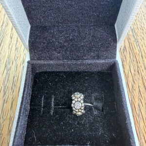 RETIRED Pandora “Her Majesty “ spacer charm.  791122CZ